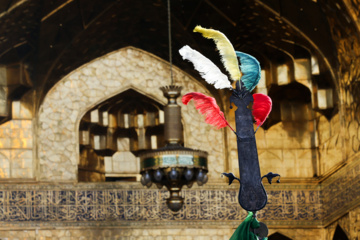 Servants change dome flag at Imam Reza (AS) shrine