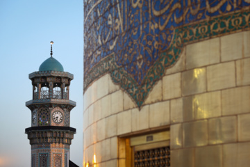 Servants change dome flag at Imam Reza (AS) shrine