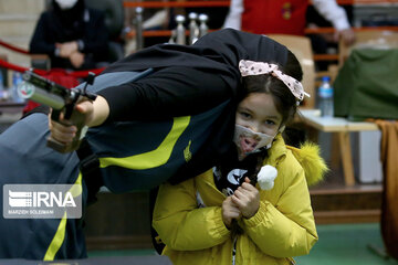 Female shooters competing in Tehran