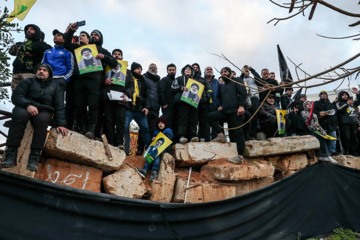 En images : les temps forts des funérailles des martyrs Nasrallah et Safieddine